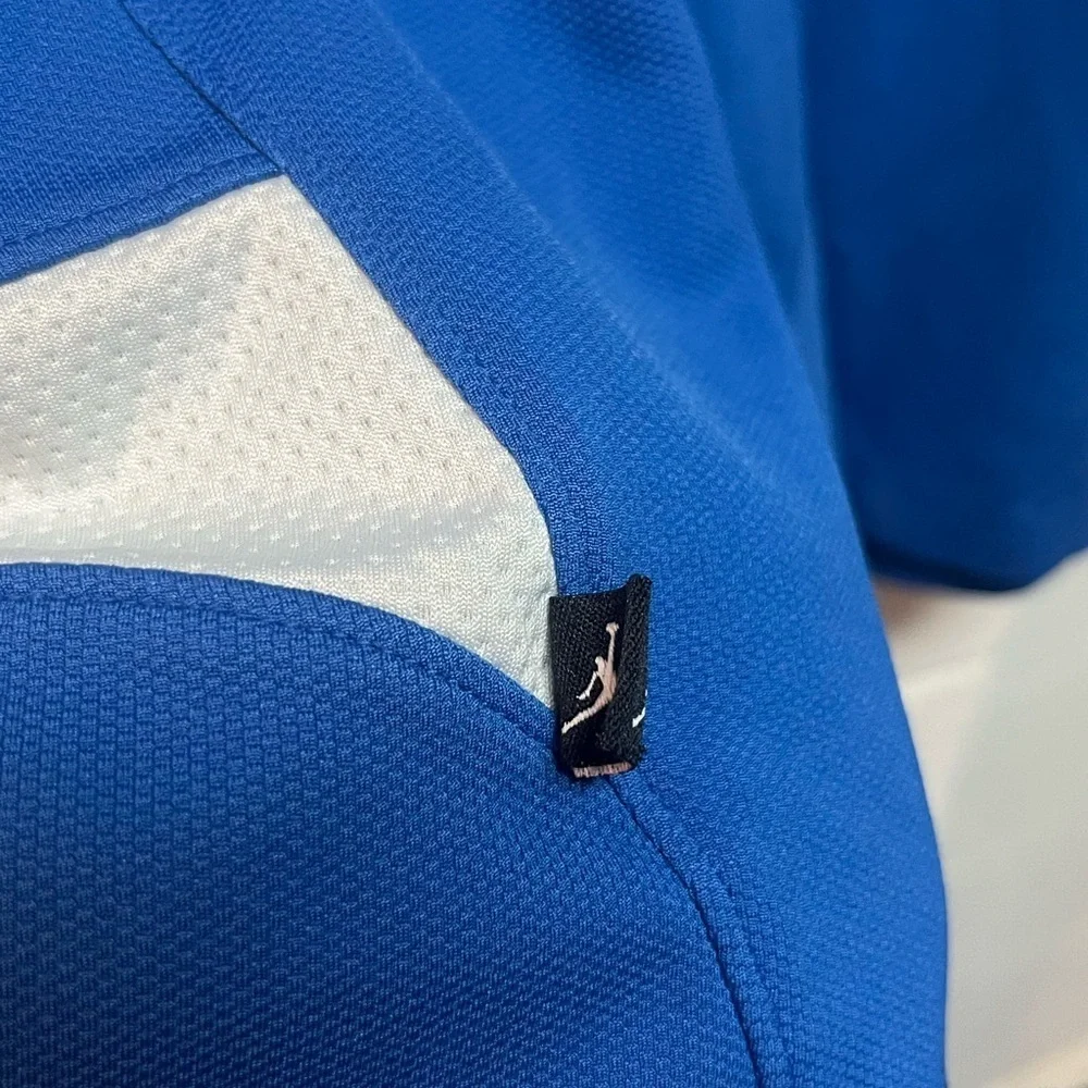 Jordan Athletic Shorts in Blue with White Stripes. Medium